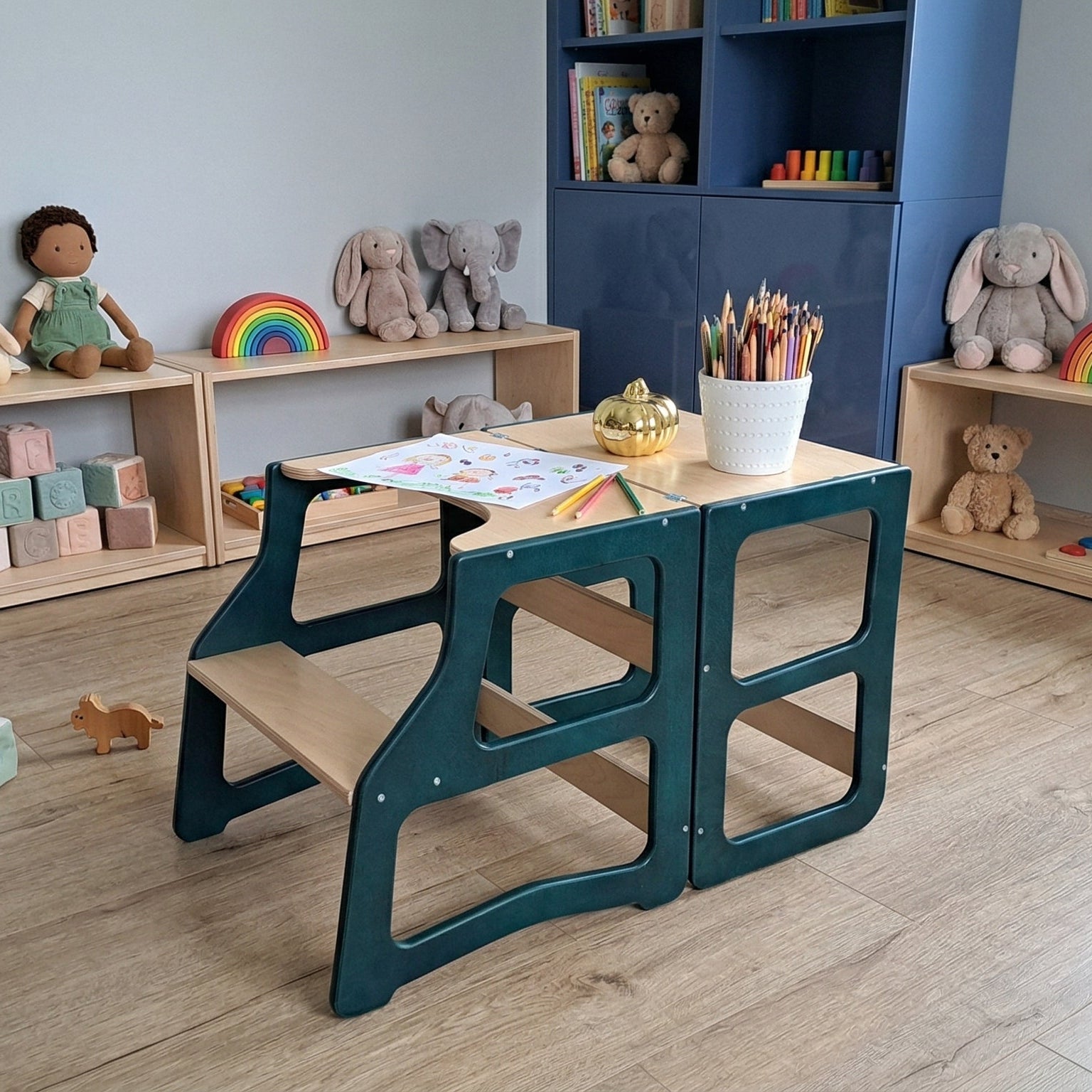Children's playroom with educational toys and a wooden chair.